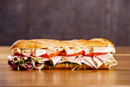 sándwich club - Turkey sandwich with cheese lettuce and tomato Foto de stock - Super Valor sin royalties y Suscripción, Código: 400-05178986