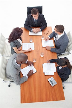 High Angle of multi-ethnic business people having a meeting Stock Photo - Budget Royalty-Free & Subscription, Code: 400-05179266