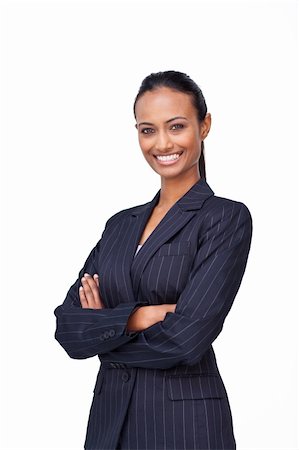 Smiling ethnic businesswoman with folded arms Stock Photo - Budget Royalty-Free & Subscription, Code: 400-05179296