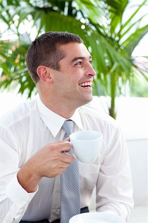 simsearch:400-05714996,k - Happy businessman relaxing with a cup of coffee Foto de stock - Super Valor sin royalties y Suscripción, Código: 400-05179443