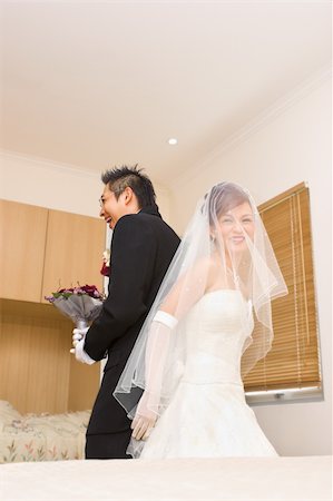 Bride and groom to be back each other Stock Photo - Budget Royalty-Free & Subscription, Code: 400-05170264