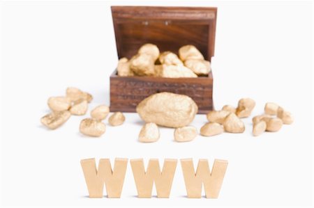 simsearch:400-04639602,k - WWW bring wealth concept using WWW characters block with treasure chest and golden nuggets Stock Photo - Budget Royalty-Free & Subscription, Code: 400-05170275