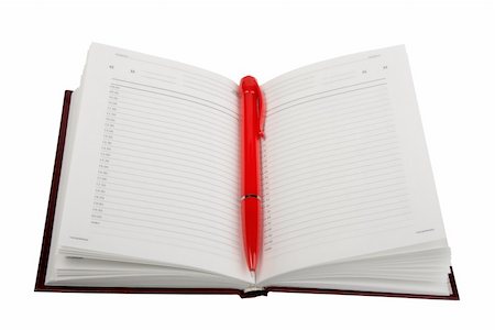 Empty open diary and red ball point pen. Close-up. Isolated on white background. Stock Photo - Budget Royalty-Free & Subscription, Code: 400-05170322