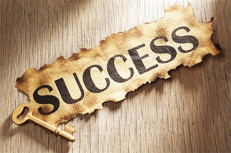 simsearch:400-04138611,k - Key to success concept using burnt paper with word success printed on it and golden key placed on its side Stock Photo - Budget Royalty-Free & Subscription, Code: 400-05170356