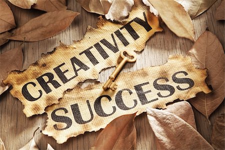 simsearch:400-04138611,k - Creativity is key to success concept using words printed on burnt paper and related objects, surrounded with dry leaf Stock Photo - Budget Royalty-Free & Subscription, Code: 400-05170352