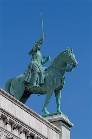 simsearch:400-08318159,k - Sculpture on the cathedral of Sacre Coeur. Paris, France Foto de stock - Royalty-Free Super Valor e Assinatura, Número: 400-05170870