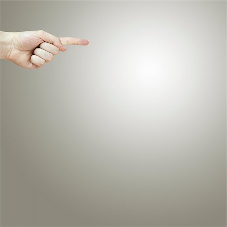 A finger sign showing where to go. Fotografie stock - Microstock e Abbonamento, Codice: 400-05171602
