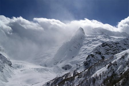 Mountain peaks in the clouds. Stock Photo - Budget Royalty-Free & Subscription, Code: 400-05172617