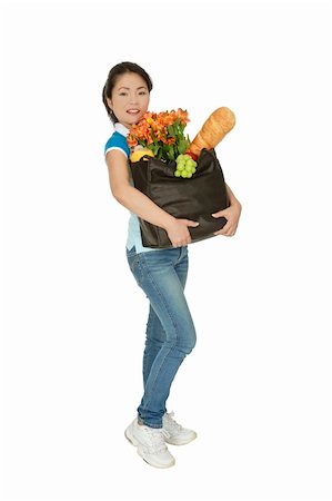 shopping in health store vitamins - Beautiful Asian woman carrying a bag of groceries Stock Photo - Budget Royalty-Free & Subscription, Code: 400-05172788