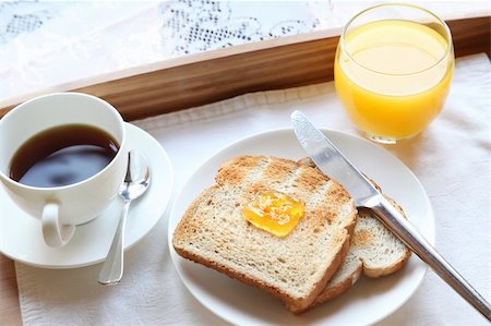 Elegant luxury breakfast with toast coffee and orange juice Stock Photo - Budget Royalty-Free & Subscription, Code: 400-05172809