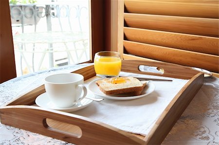Elegant luxury breakfast with toast coffee and orange juice Stock Photo - Budget Royalty-Free & Subscription, Code: 400-05172810