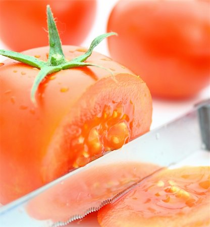 simsearch:400-07288793,k - Tomatos Photographie de stock - Aubaine LD & Abonnement, Code: 400-05173141