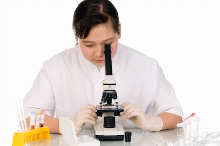 Girl with microscope, isolated on a white background. Stock Photo - Budget Royalty-Free & Subscription, Code: 400-05173333