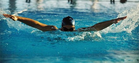 health and fitness lifestyle concept with young athlete swimmer recreating  on olimpic pool Fotografie stock - Microstock e Abbonamento, Codice: 400-05184749