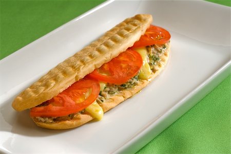 simsearch:400-08427433,k - tuna tomato and cheese grilled panini sandwich close up on a plate Photographie de stock - Aubaine LD & Abonnement, Code: 400-05185008
