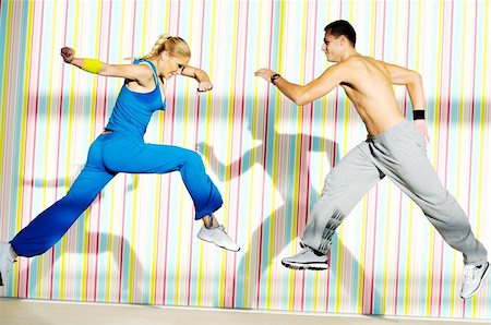 young adults in group  have fitness training and representing teamwork concept Stock Photo - Budget Royalty-Free & Subscription, Code: 400-05185372