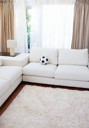 flat soccer ball - High angle of a living-room with a white couch Stock Photo - Budget Royalty-Free & Subscription, Code: 400-05185810