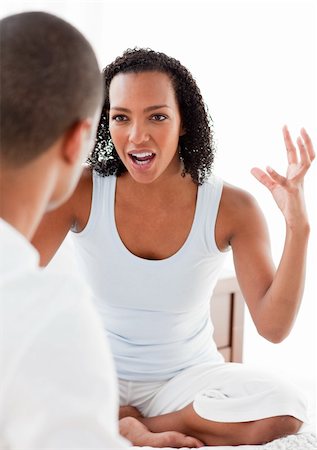 Close-up of a Young couple having an argument in the bedroom Stock Photo - Budget Royalty-Free & Subscription, Code: 400-05185811