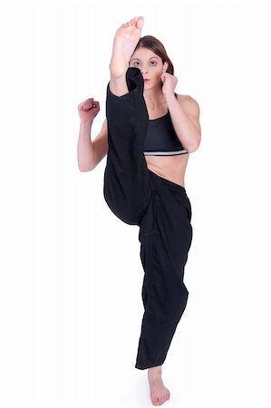 female foot kicks - Lady in Black doing Wu dang Kungfu Stock Photo - Budget Royalty-Free & Subscription, Code: 400-05185942
