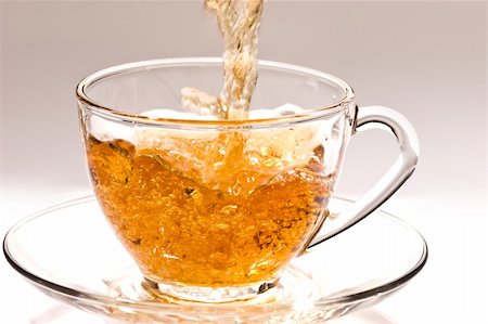 drink series: pouring tea into glassy tea cup Stock Photo - Budget Royalty-Free & Subscription, Code: 400-05186054