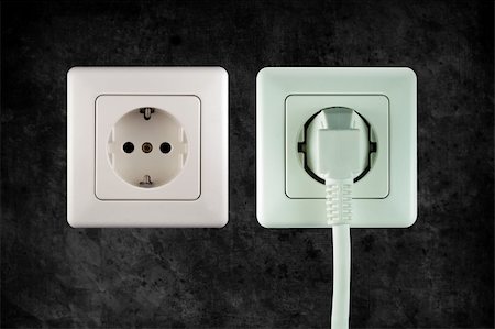 damaged electrical outlet - old socket with plugged cable in retro design look Stock Photo - Budget Royalty-Free & Subscription, Code: 400-05186795