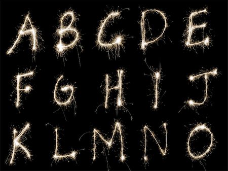 Capital letters A to O written in sparkler trails, other letters numbers and symbols available separately Foto de stock - Super Valor sin royalties y Suscripción, Código: 400-05187054