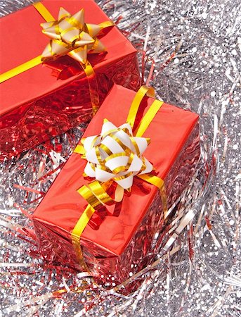 simsearch:400-05177572,k - Red Christmas balls and presents among green new year tree Stock Photo - Budget Royalty-Free & Subscription, Code: 400-05187204