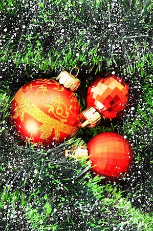 simsearch:400-05177572,k - Red Christmas balls among green new year tree Stock Photo - Budget Royalty-Free & Subscription, Code: 400-05187210