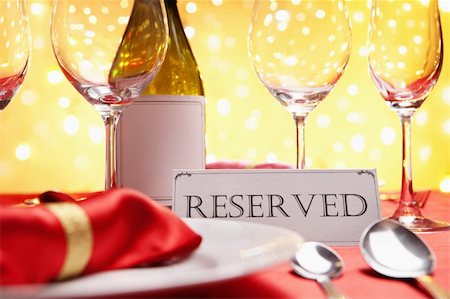 plate red wine glass - Reserved table concept, background using Christmas related Stock Photo - Budget Royalty-Free & Subscription, Code: 400-05187414