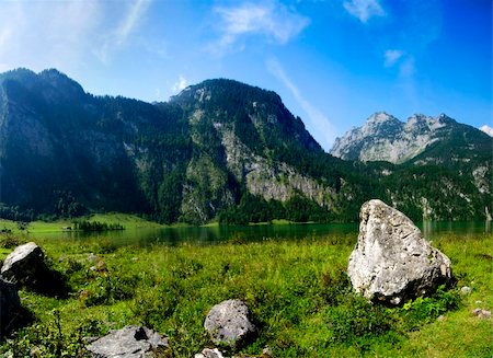 simsearch:400-04753981,k - Alpine peaks with lake and green meadow in panoramic composition Stock Photo - Budget Royalty-Free & Subscription, Code: 400-05187435