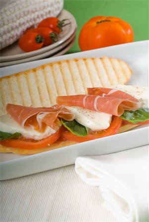 panini sandwich with fresh caprese and parma ham Stock Photo - Budget Royalty-Free & Subscription, Code: 400-05187886