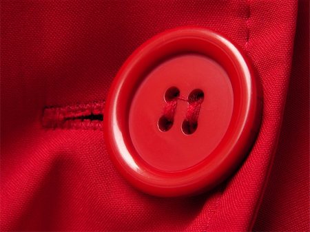 simsearch:400-05303269,k - red button closeup with shallow DOF red clothes background Stock Photo - Budget Royalty-Free & Subscription, Code: 400-05188121