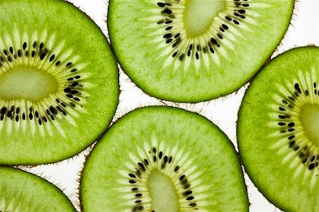 Sliced Kiwifruit isolated on white studio shot Stock Photo - Budget Royalty-Free & Subscription, Code: 400-05188289