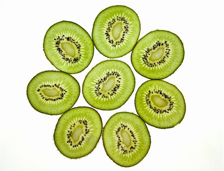 Sliced Kiwifruit isolated on white studio shot Stock Photo - Budget Royalty-Free & Subscription, Code: 400-05188291