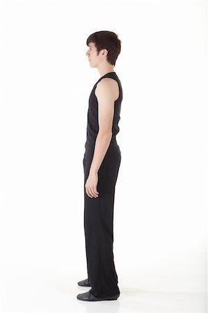 Young caucasian Modern Jazz dancer in a black top and black pants on a white background displaying various positions. NOT ISOLATED Stock Photo - Budget Royalty-Free & Subscription, Code: 400-05188530