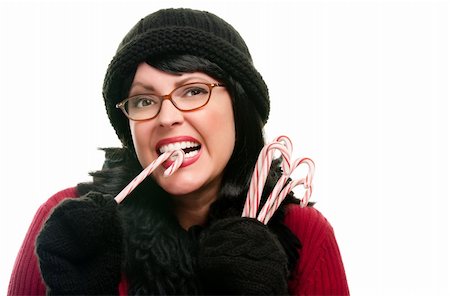 simsearch:400-05217778,k - Pretty Woman Holding Candy Canes Isolated on a White Background. Foto de stock - Super Valor sin royalties y Suscripción, Código: 400-05188645