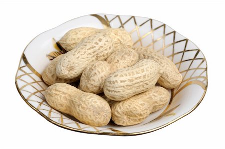 simsearch:400-04136218,k - Peanuts in a white plate on a white background, isolated Stockbilder - Microstock & Abonnement, Bildnummer: 400-05189224