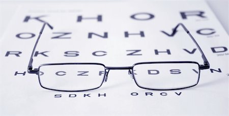 simsearch:400-05381013,k - Glasses on test chart Photographie de stock - Aubaine LD & Abonnement, Code: 400-05189309