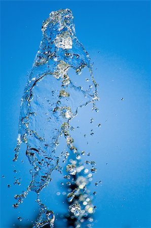 Fountain of pure water over blue clear sky Stock Photo - Budget Royalty-Free & Subscription, Code: 400-05180072
