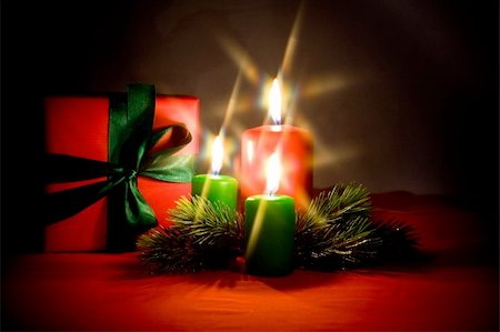 simsearch:400-04272073,k - Burning xmas candle and little gift box. Christmas decorations of the cross filter effect Foto de stock - Super Valor sin royalties y Suscripción, Código: 400-05180088