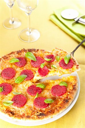 parmesan cheese pieces isolated - delicious melted cheese and pepperoni pizza basil Stock Photo - Budget Royalty-Free & Subscription, Code: 400-05180182