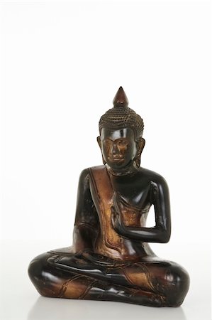 simsearch:400-05099216,k - Wooden Buddha statue isolated on a white bachground Stock Photo - Budget Royalty-Free & Subscription, Code: 400-05180755