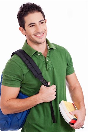 Smiling Young student carrying bag and books on a white isolated background Stock Photo - Budget Royalty-Free & Subscription, Code: 400-05181341