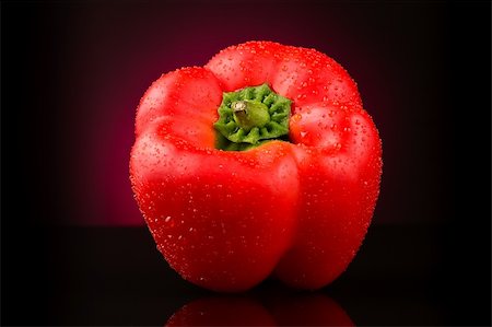 paprika in water - Red sweet pepper with water drops on  dark red background Stock Photo - Budget Royalty-Free & Subscription, Code: 400-05181893