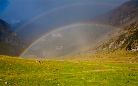 pyrenees cliff - Rainbow over Odessa Canyon in France. Summer time Stock Photo - Budget Royalty-Free & Subscription, Code: 400-05182004