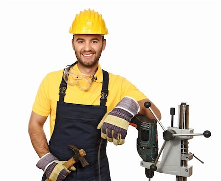 portrait of smiling handyman at work isolated on white Photographie de stock - Aubaine LD & Abonnement, Code: 400-05182754