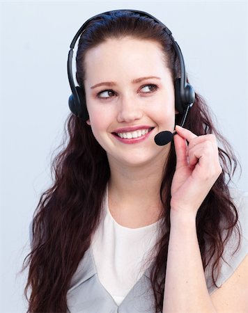 simsearch:400-03990860,k - Smiling brunette woman working in a call center Photographie de stock - Aubaine LD & Abonnement, Code: 400-05183249