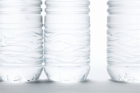 simsearch:400-04713076,k - Water Bottles Abstract Image on a Gradated White Background. Foto de stock - Super Valor sin royalties y Suscripción, Código: 400-05194812