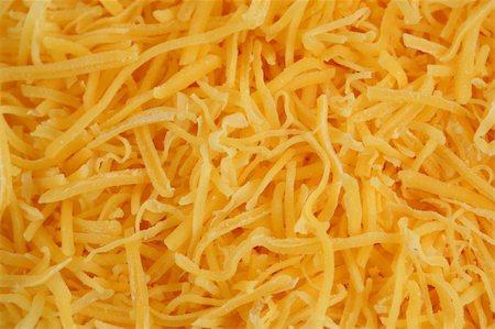 A Shredded cheddar cheese background Photographie de stock - Aubaine LD & Abonnement, Code: 400-05195013