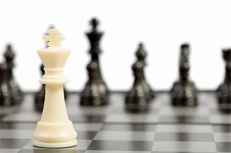 chessmen on a chessboard Stock Photo - Budget Royalty-Free & Subscription, Code: 400-05195339
